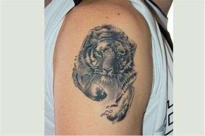 Фото и  значения татуировки Тигр. X_993cbfce
